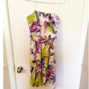 Sleeveless multi color floral dress with belt